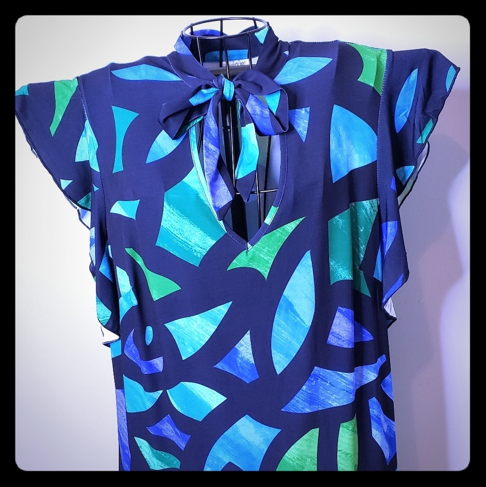 Avenue Tie neck dress with a fun print!
